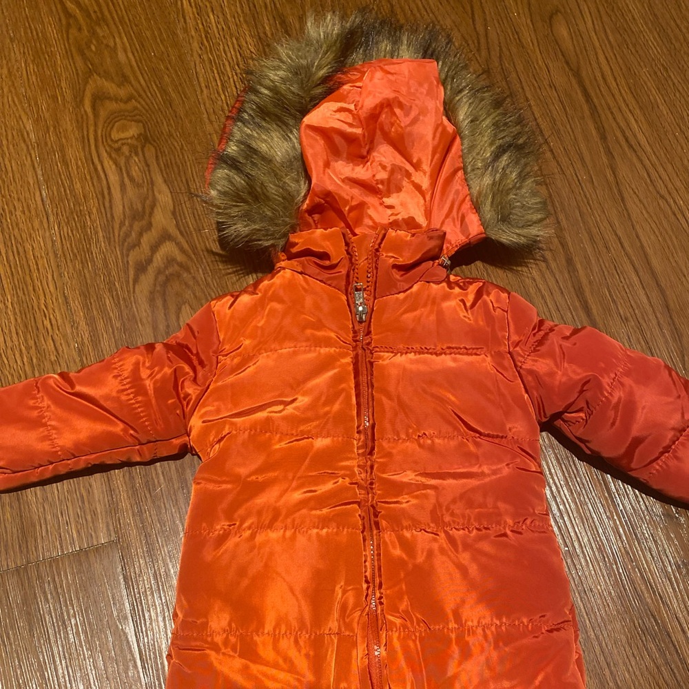 Burnt orange baby snowsuit. Size 0-12 months *BRAND NEW*